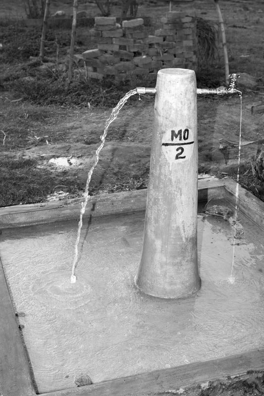 Integrated Solution for Rural Drinking Water Challenges - ill-maintained public standpoint where the missing tap has not been replaced leading to wastage of safe drinking water in an arsenic-affected village in district Bhojpur, Bihar